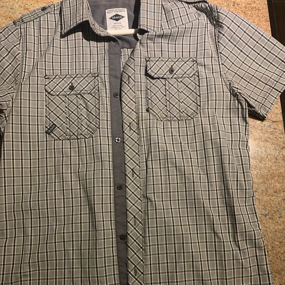 Men’s button up plaid shirt. New condition
